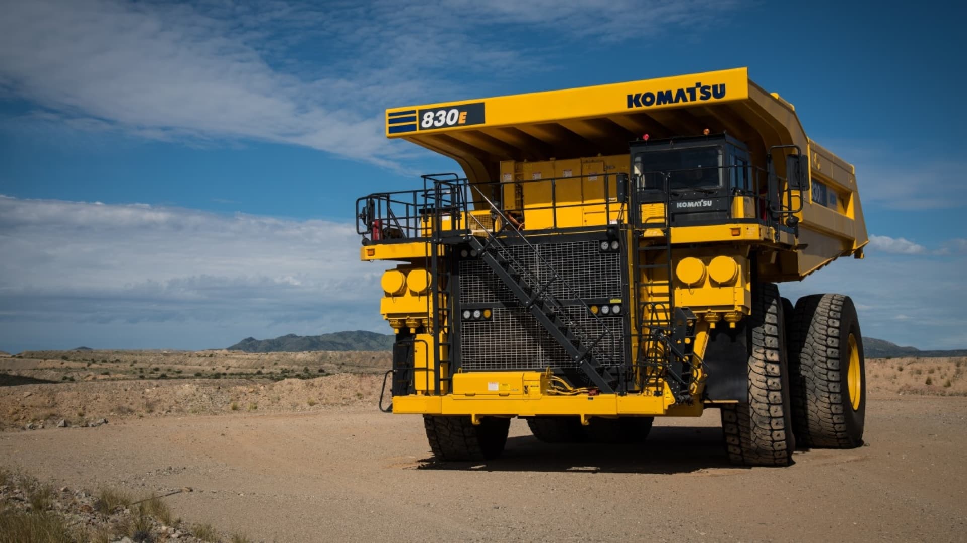 a yellow komatsu truck